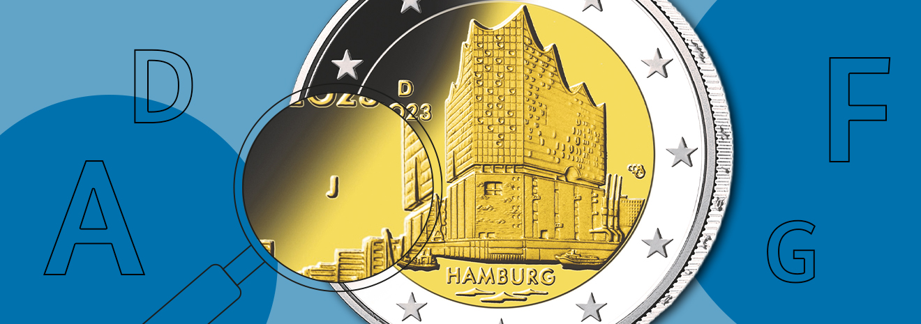 Grafik mit einer 2-Euro-Sammlermünze „Bremen“ und Fokus auf das Münzzeichen „J“.